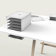 Illustration for article titled A Co-Working Table With Hidden Depths